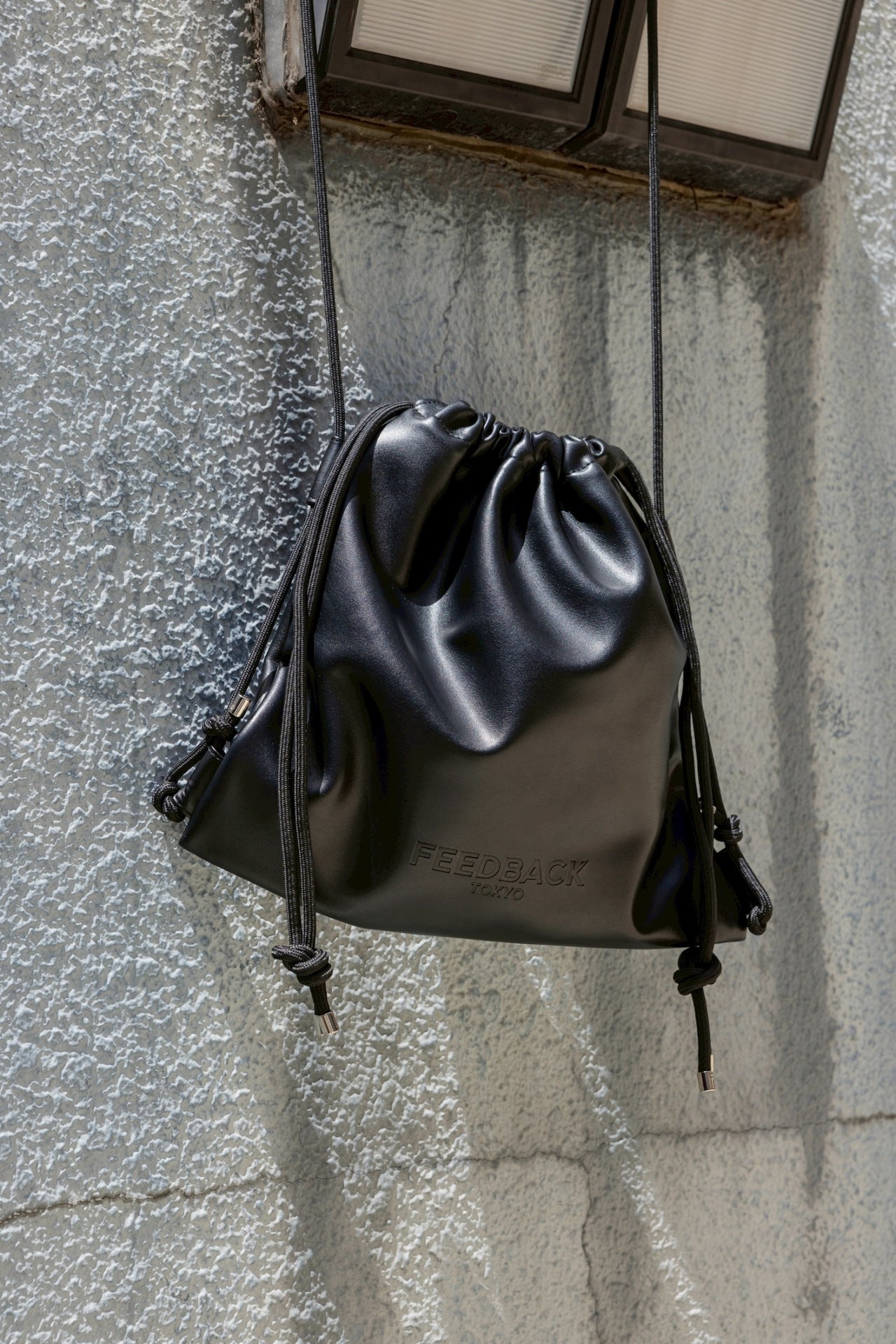 FEEDBACK Leather Drawstring Bag